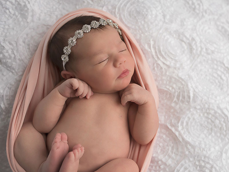 Portrait of newborn baby swaddled on white blanket by Southern Pennsylvania and Philadelphia newborn photographer Tara Lynn of Silver Orchid Photography